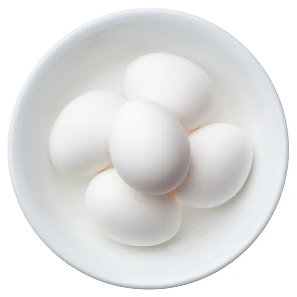 Ouă albe într-un castron izolat pe fundal alb — Fotografie, imagine de stoc