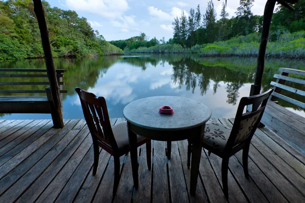 Table and chairs with lake view at Sabah, Malaysia — Stock Photo, Image
