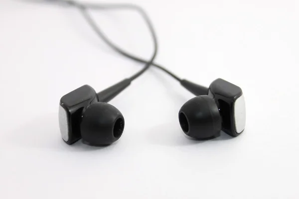 Earphones over white background — Stock Photo, Image