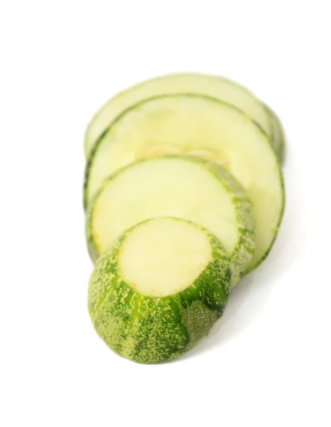 Sliced cucumber over white background — Stock Photo, Image