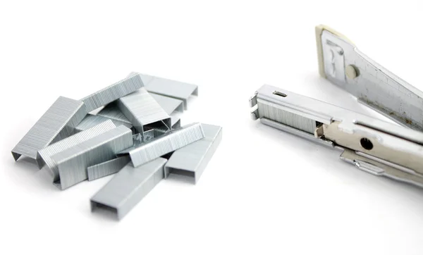 Stapler and staples isolated on white — Stock Photo, Image