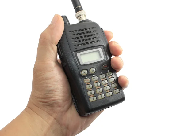 Mão segurando rádio presunto preto isolado em branco — Fotografia de Stock