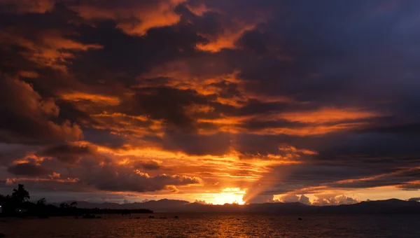 Dramatic ray of lights at sunset — Stock Photo, Image