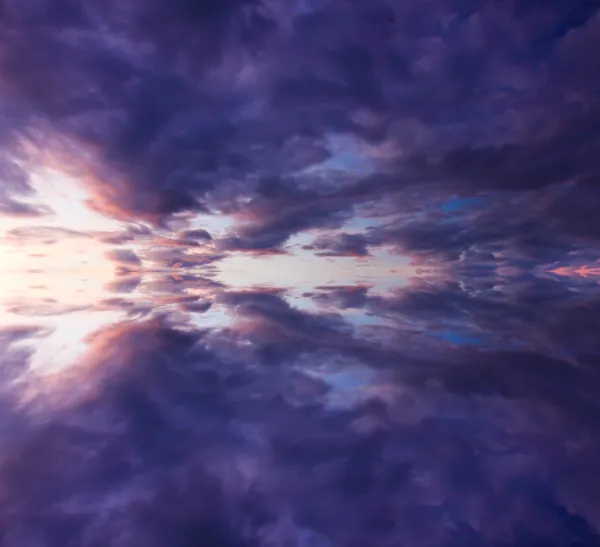 Reflection of dramatic clouds — Stock Photo, Image