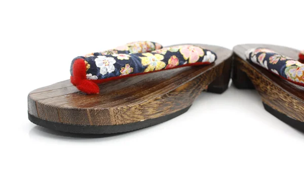 Dřevěné sandály bílé pozadí — Stock fotografie