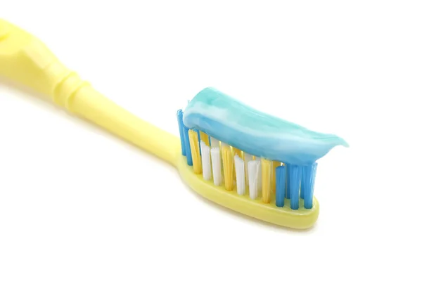 Tooth brush with toothpaste over white background — Stock Photo, Image