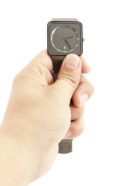 Mão segurando um relógio isolado no branco — Fotografia de Stock