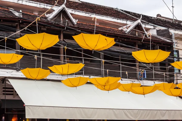 Street decorated with yellow umbrellas — Stock Photo, Image