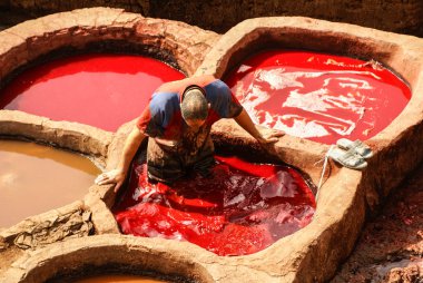 Fez, Morocco. The tannery souk of weavers is the most visited pa clipart