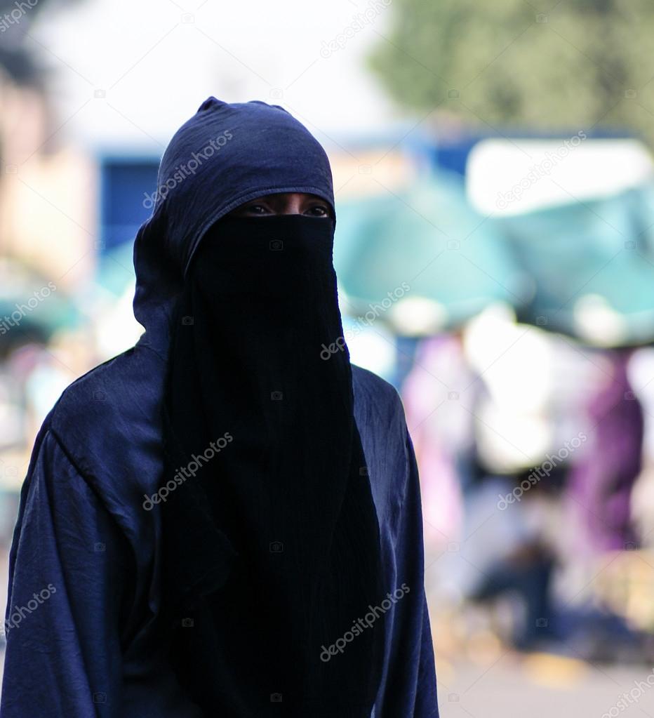 Unidentified woman at a street in Marrakesh 