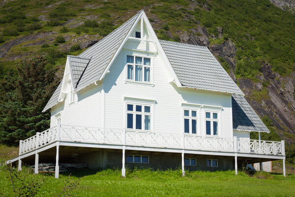 Old wooden architecture in Norway. White home