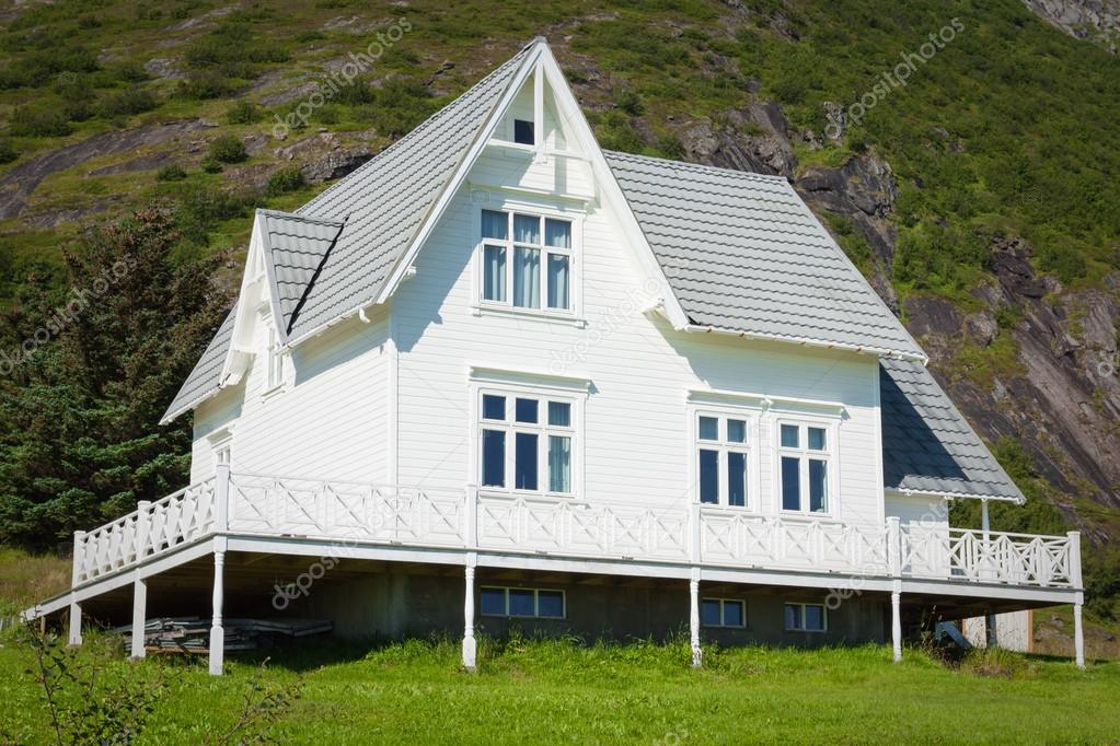 Old wooden architecture in Norway. White home