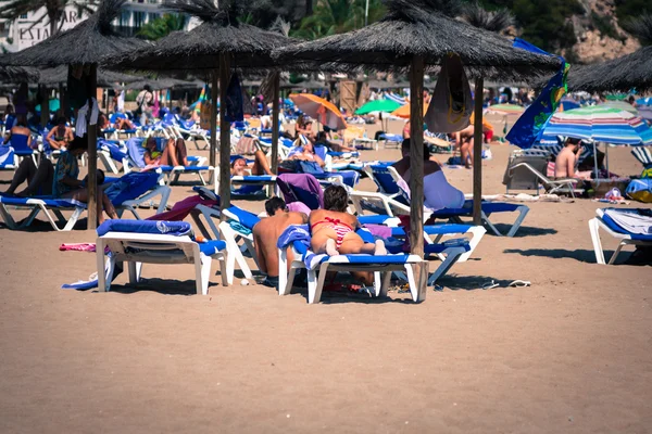 Отдых на пляже San Vicent Ibiza, Испания — стоковое фото