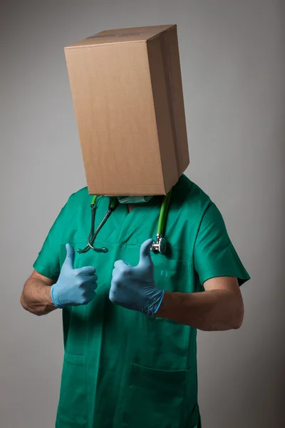 Doctor with cardboard box head — Stock Photo, Image