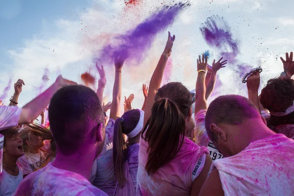 People at The Color Run event in Milan, Italy Stock Image