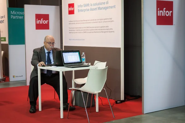 Businessman at Smau exhibition in Milan, Italy