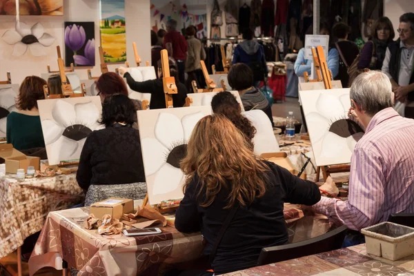 People painting at Weekend Donna 2013 in Milan, Italy — Stock Photo, Image