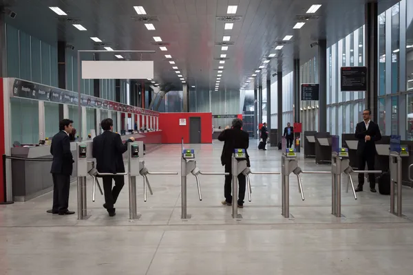 People and turnstiles at EICMA 2013 in Milan, Italy — Stock Photo, Image