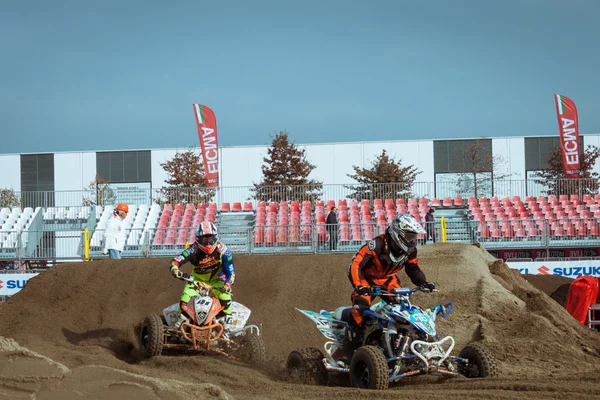 Carrera de quads en la EICMA 2013 en Milán, Italia — Foto de Stock