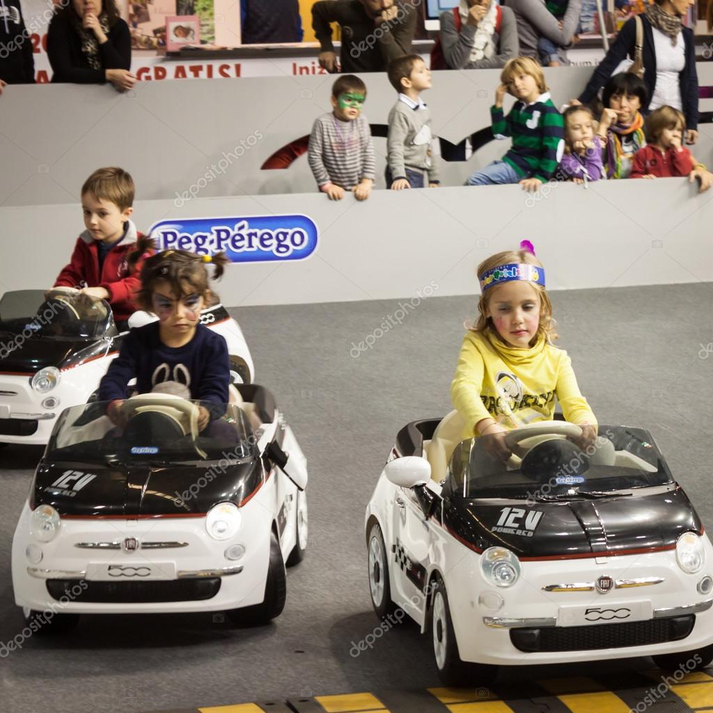 kids driving electric cars