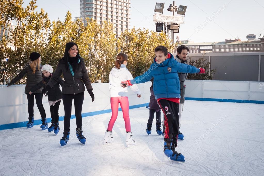 People skating on ice rink in Milan, Italy Stock Editorial Photo