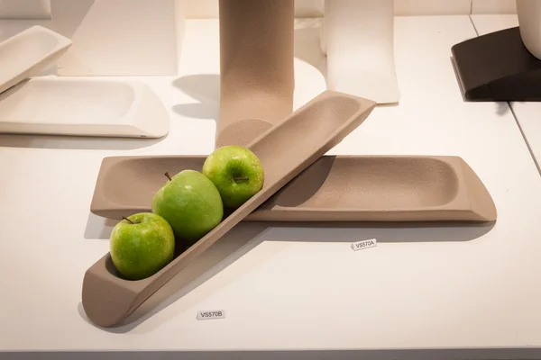 Decorative objects with green apples on display at HOMI, home international show in Milan, Italy — Stock Photo, Image