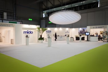 People visiting Mido 2014 in Milan, Italy clipart