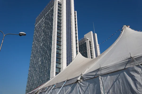 Big top and modern buildings at Milan Clown Festival 2014 — Stock Photo, Image