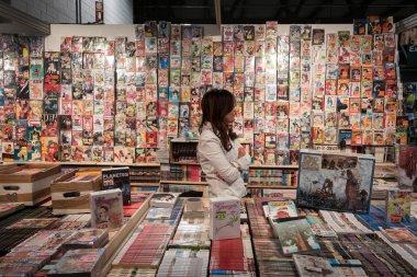 Comics on display at Cartoomics 2014 in Milan, Italy clipart