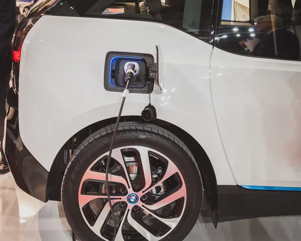 Detail of an electric car under charge at Solarexpo 2014 in Milan, Italy — Stock Photo, Image
