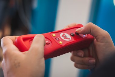 Close up of red Nintendo Wii mini controller clipart