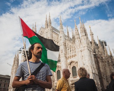 People protesting against Gaza strip bombing in Milan, Italy clipart
