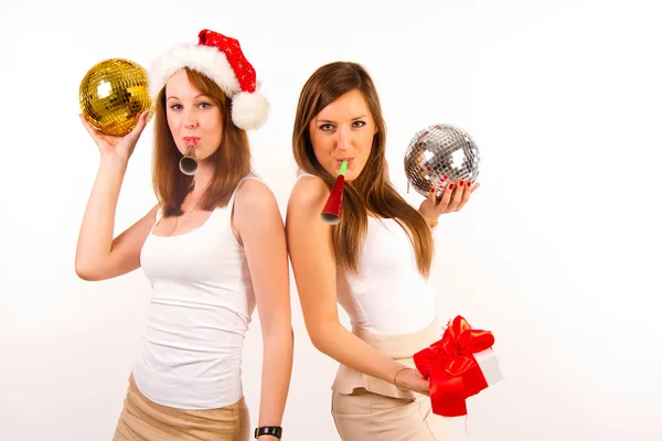 Portrait of sexy girls posing in studio with presents — Stock Photo, Image