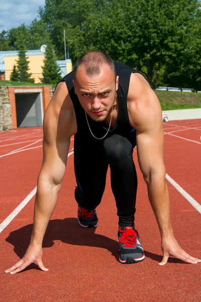 Image of muscle man ready to run — Stock Photo, Image