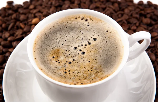 Cup of black coffee with foam — Stock Photo, Image