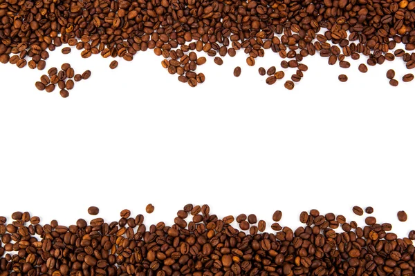 Много жареных кофейных зерен — стоковое фото