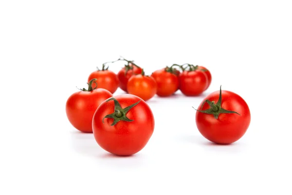 Rode tomaten op een witte achtergrond — Stockfoto