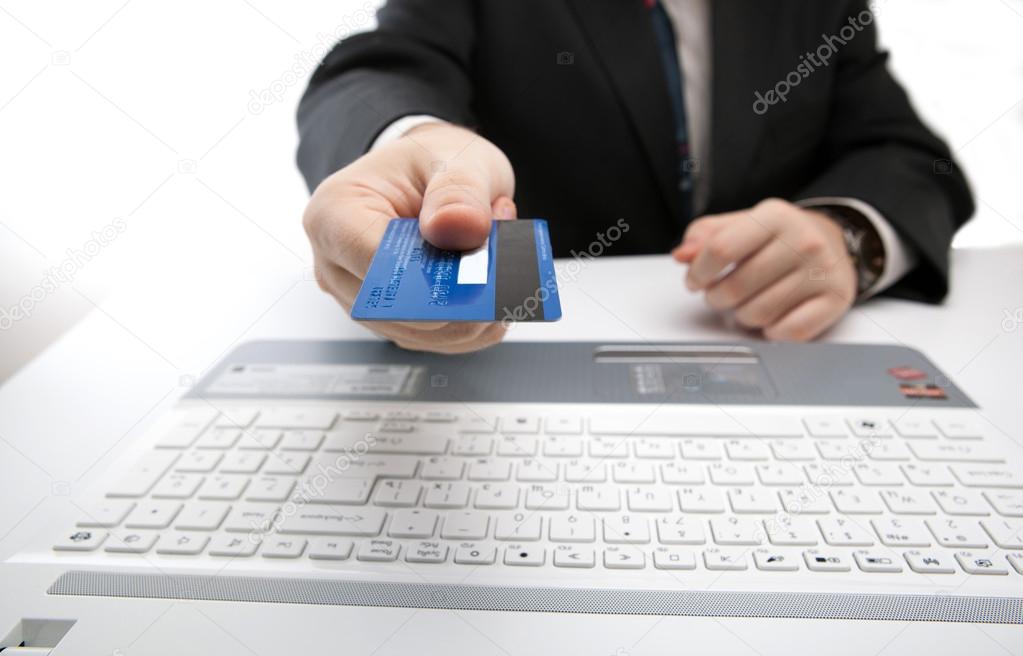 Credit card in hand when you pay