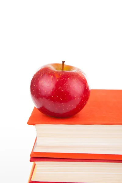 Stack of books with red apple — Stock Photo, Image