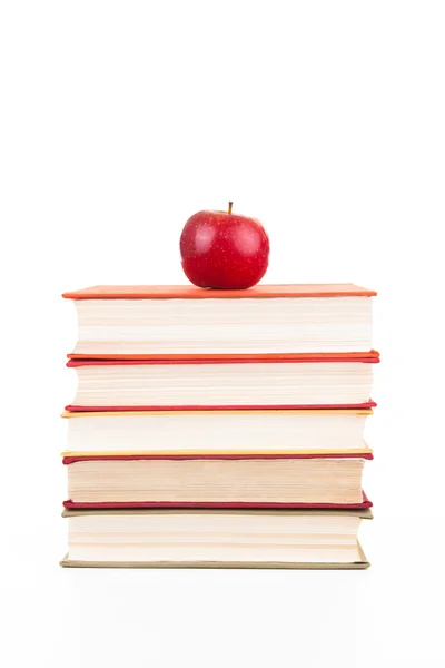 Stack of books with red apple — Stock Photo, Image