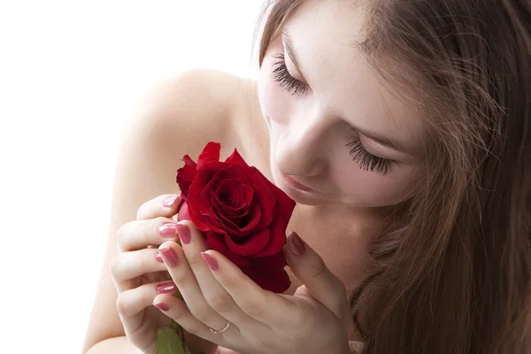 Portrait of a young girl with a rose — Stock Photo, Image