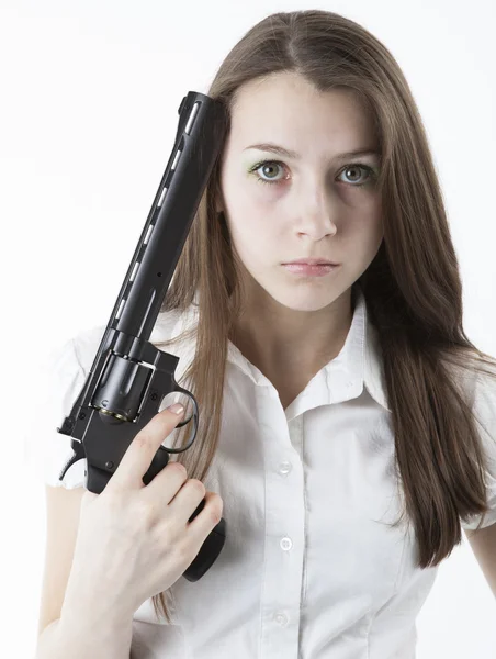 Young girl holding a pistol — Stock Photo, Image