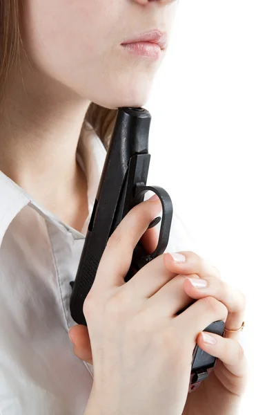 Menina segurando uma pistola — Fotografia de Stock