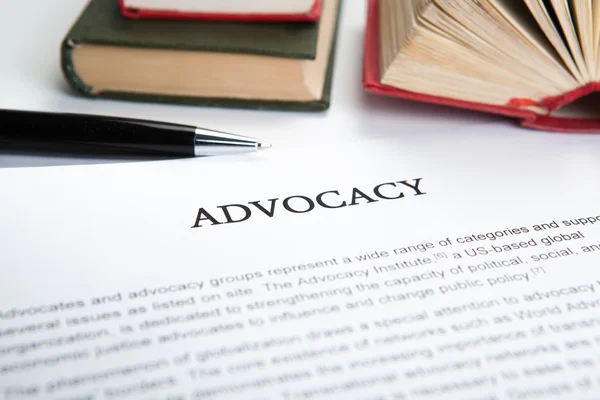 Document with the title of advocacy — Stock Photo, Image