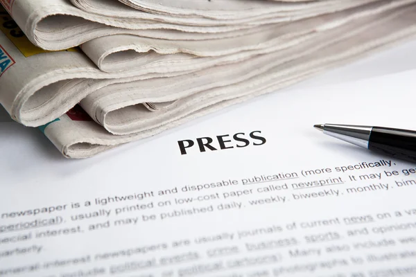Document with the title of press — Stock Photo, Image