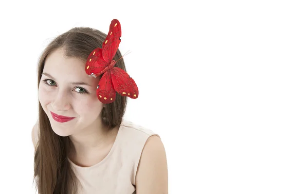 Portrait of a girl with a butterfly on her head — Stock Photo, Image