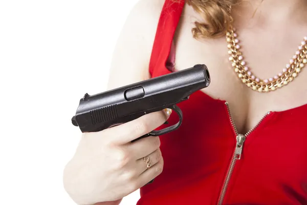 Signora in rosso con una pistola in mano — Foto Stock