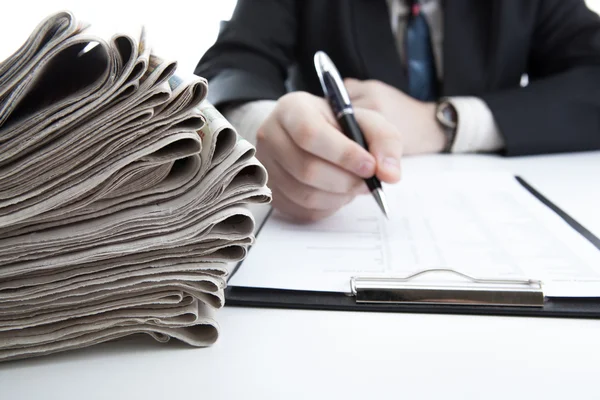 Man is looking for information in the in the budget figures — Stock Photo, Image