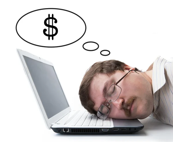 Employee at the computer dreaming currency — Stock Photo, Image