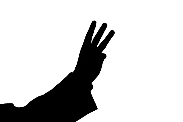Man 's hand showing three black — стоковое фото